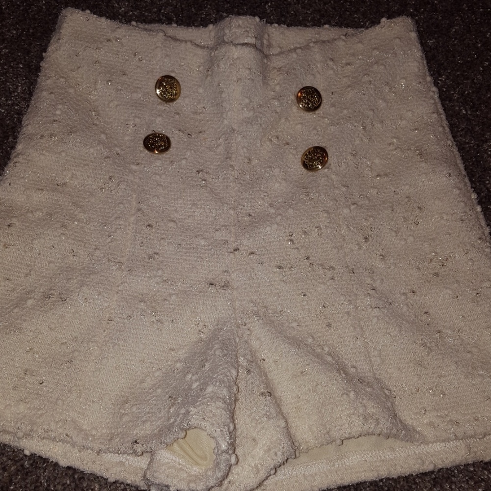 Cream colored textured high waisted shorts